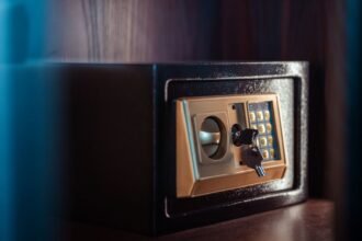 small home safe with an electronic keypad lock the type anchored down for secure firearm storage