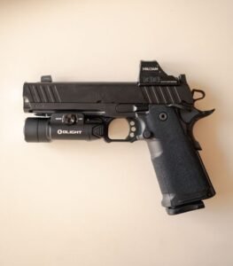 tactical handgun with mounted optic on a milled slide cut