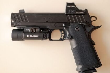 Tactical handgun with mounted optic on a milled slide cut