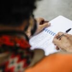 writing in a spiral notebook with a ballpoint pen a quick drying choice for left handed writers