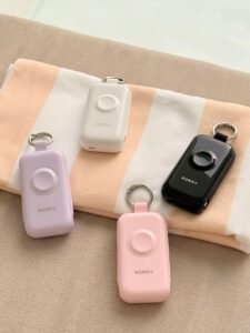 personal safety alarms with keyring clips in pastel and black finishes
