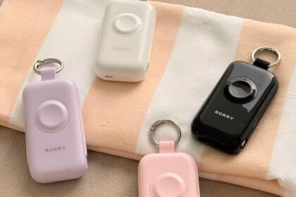 Personal safety alarms with keyring clips in pastel and black finishes