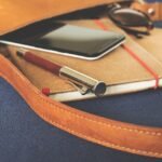 what actually fits in a small crossbody purse for light travel