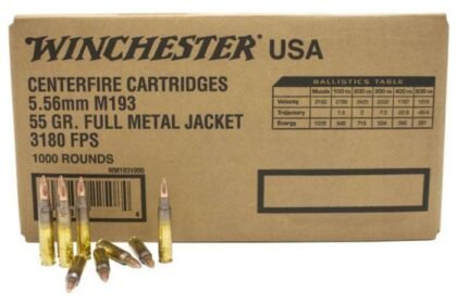 Brown Winchester USA cartridge box labeled 5.56mm M193, 55 gr full metal jacket, with several loose bullets placed in front on a white background.