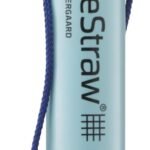 light blue lifestraw personal water filter with purple cap and blue lanyard for drinking from on the go water sources