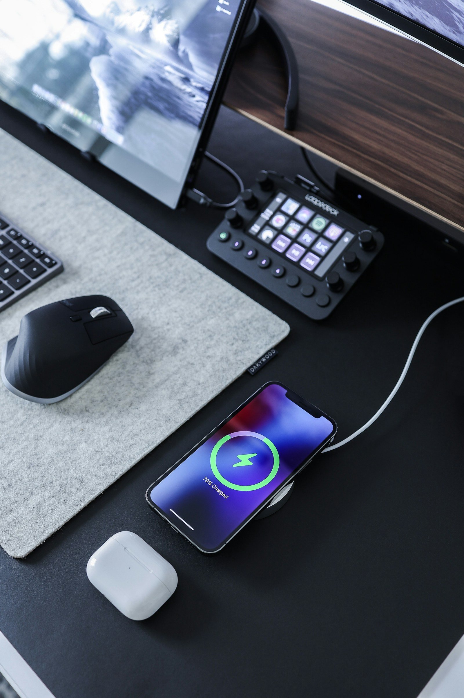 phone attached to a magnetic charging accessory