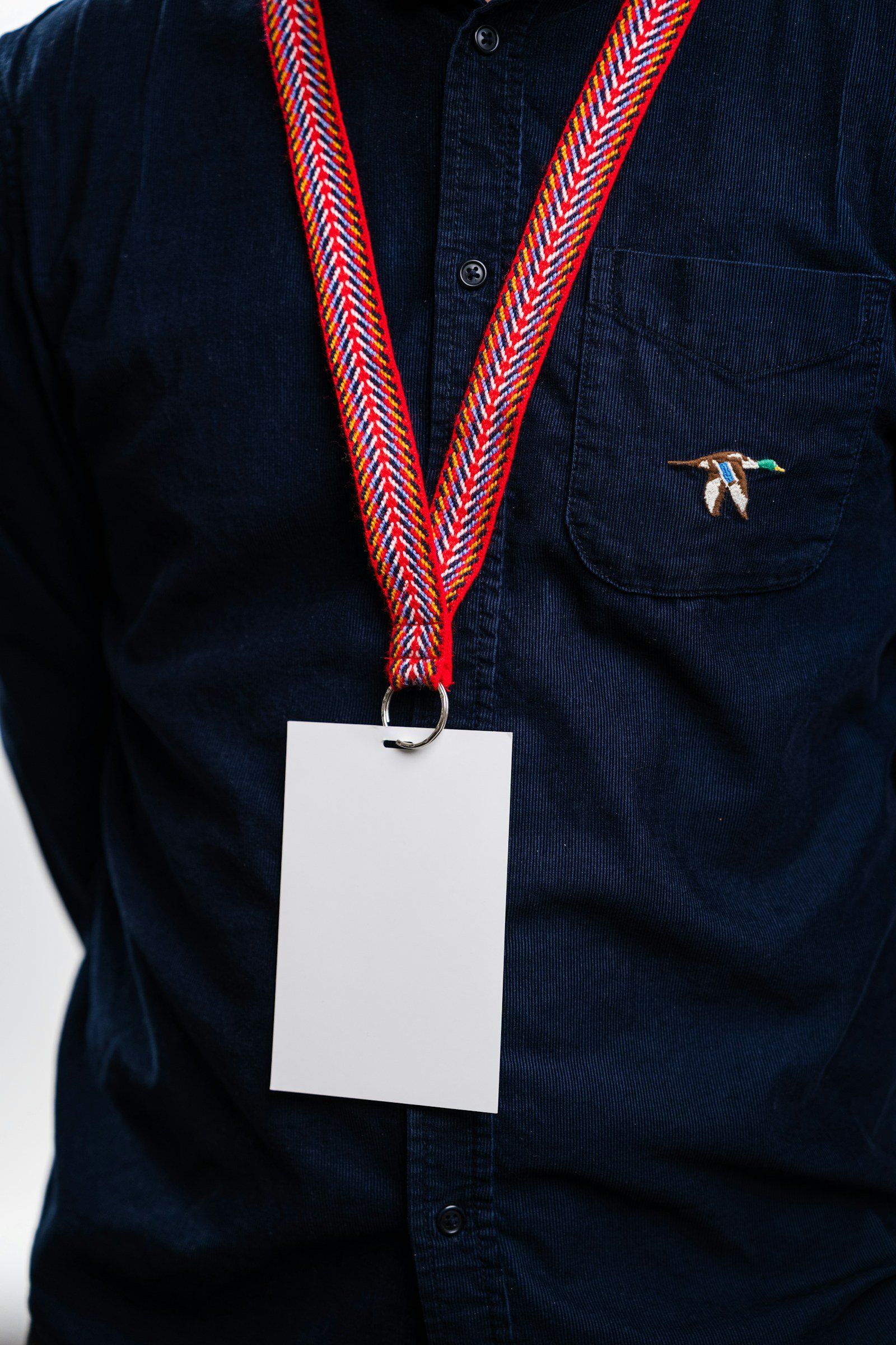 badgeholdermultiplecards edc deals person wearing a badge lanyard with a card holder