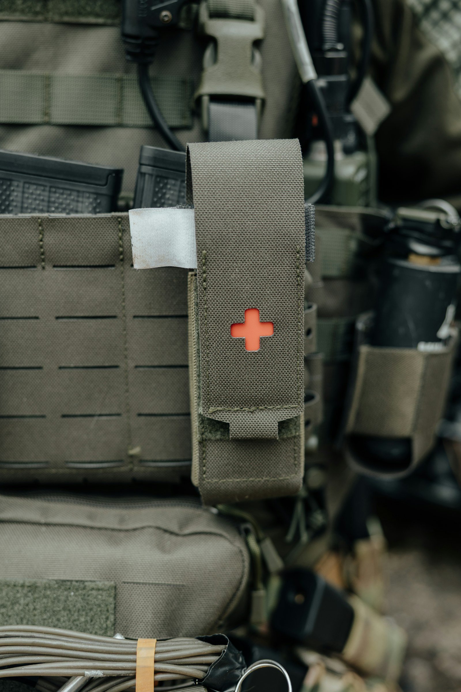 a tactical medical pouch carried on a vest