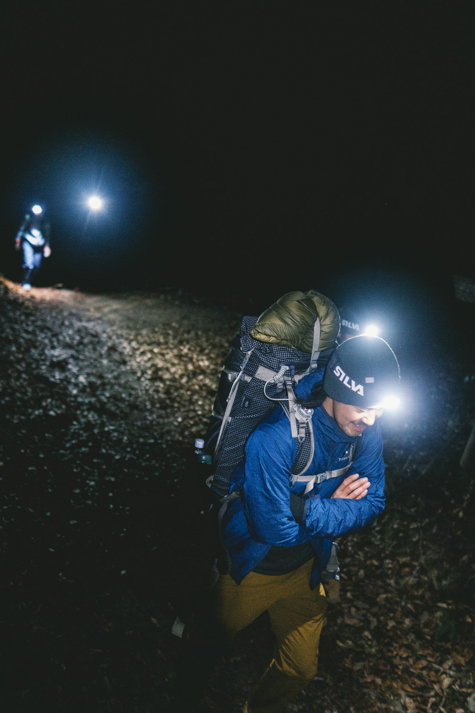 headlampwontchargeusbc edc deals person wearing a headlamp in the dark