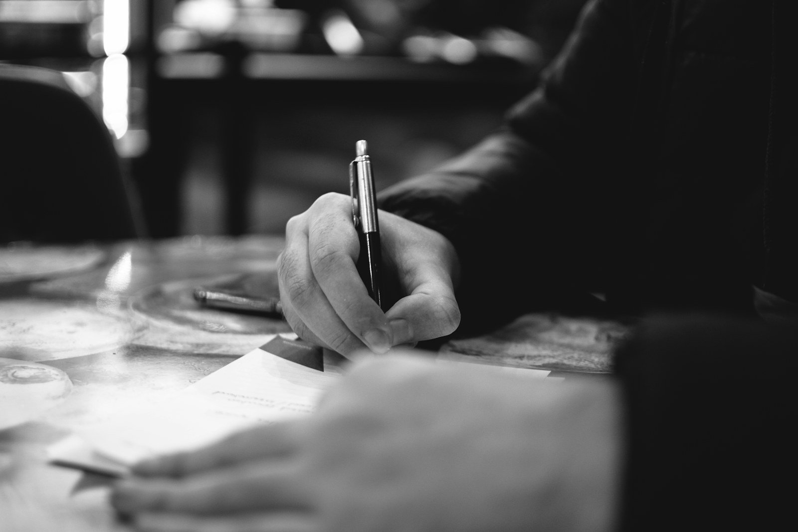 penskipsevenwithink edc deals hand writing on paper with a pen