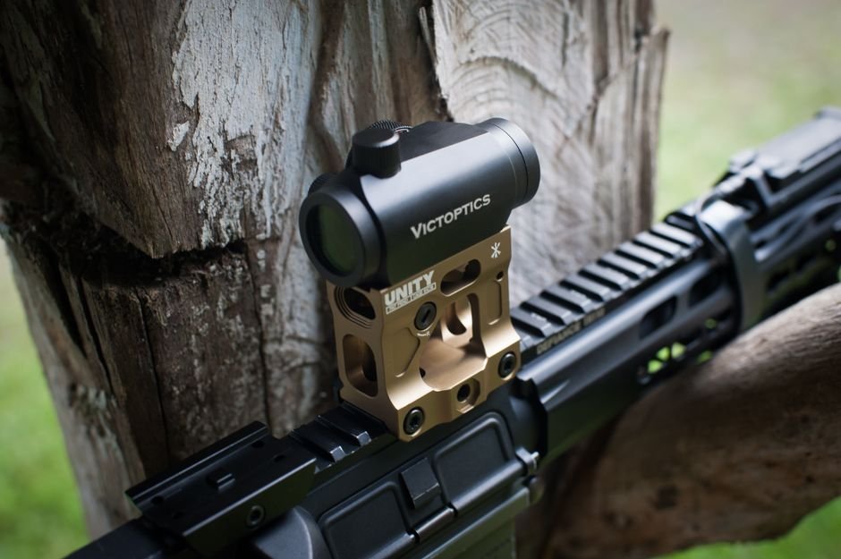 red dot sight mounted on a firearm