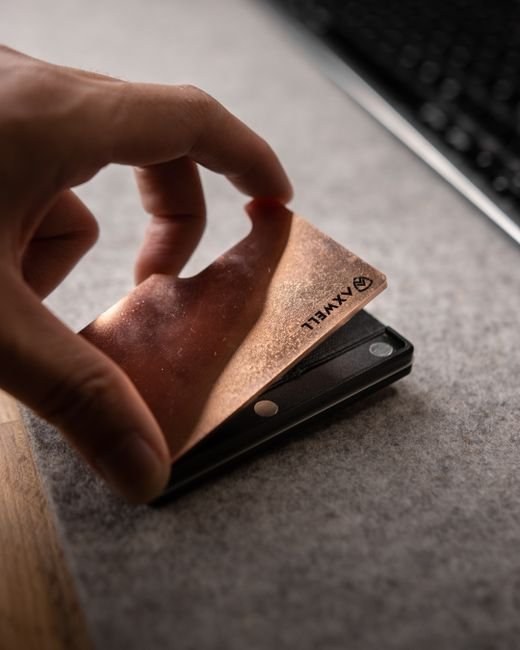 metallic rfid blocking card wallet held in hand