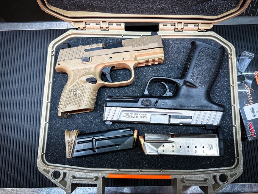 pexels15191952 edc deals pistols and spare magazines arranged in a case illustrating concealed mag carrier options