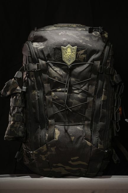 heavy duty tactical backpack used as a range bag for organizing shooting gear