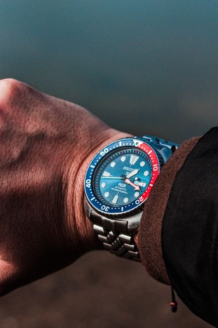 stainless steel wristwatch worn outdoors for everyday carry