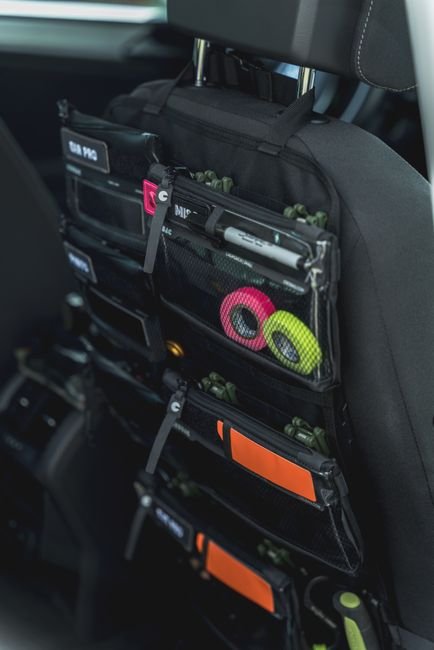pexels30563011 edc deals a multi pocket car seat back organizer with colorful accessories for convenient storage