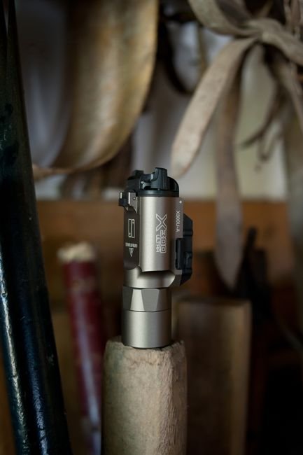 pexels30871039 edc deals tactical flashlight with metallic finish in rustic setting