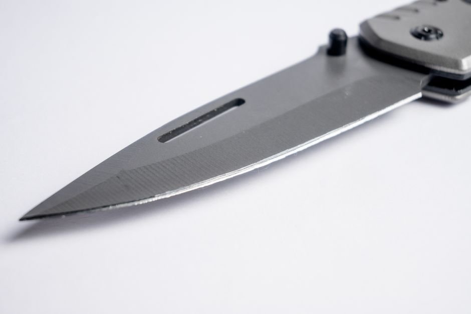 sharp stainless steel folding knife blade close up for edc selection