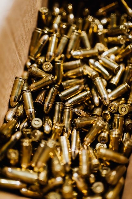 brass ammunition rounds boxed for storage illustrating a bulk ammo order size comparison
