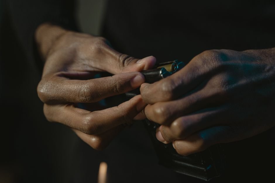 pexels6091664 edc deals hands loading self defense hollow point cartridges into a pistol magazine