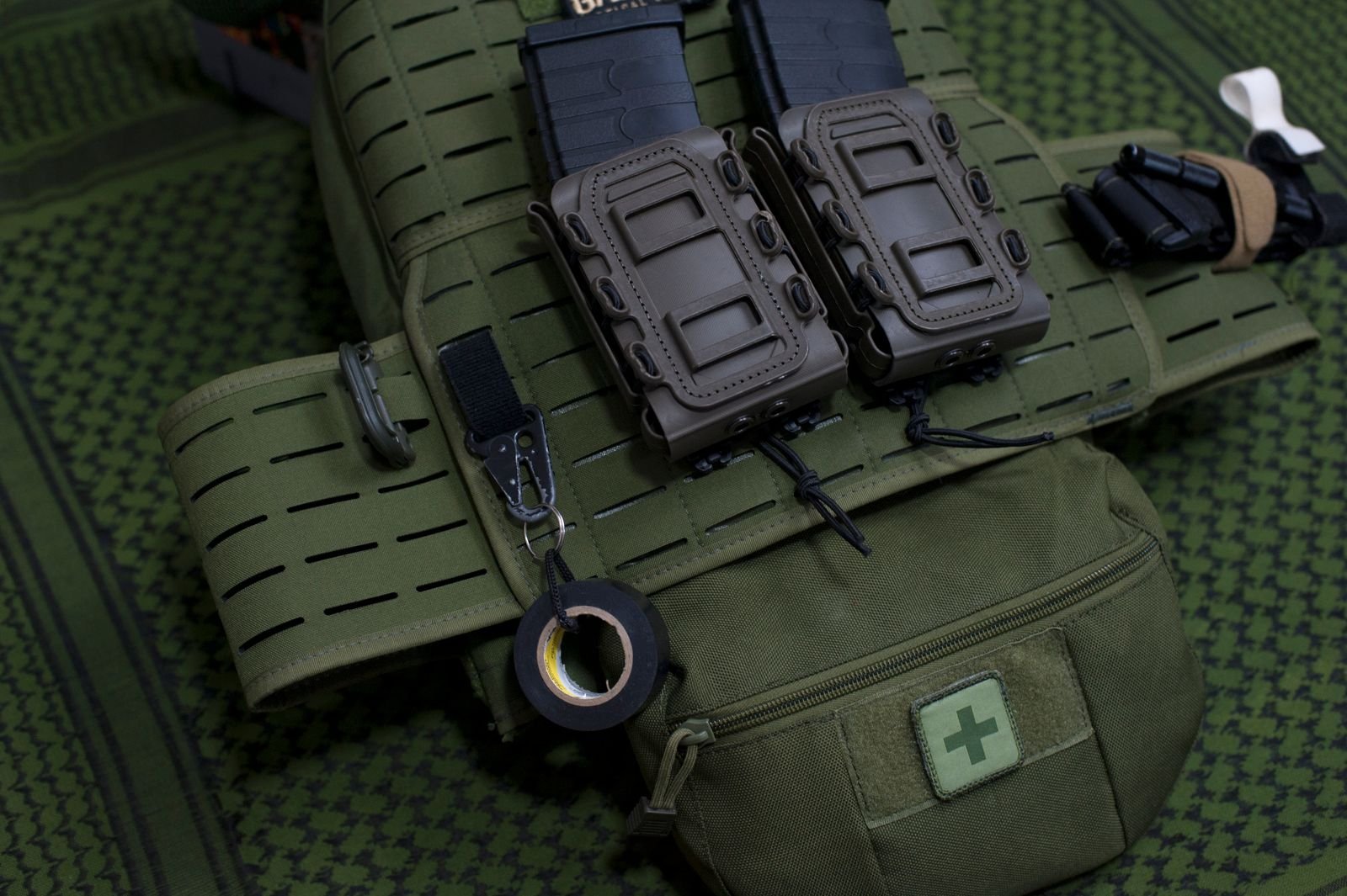 pexelsphoto6562582 edc deals nylon pouches mounted on a load bearing rig exposed to the elements