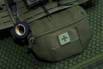 nylon utility pouch mounted on webbing showing fabric weave and stitching